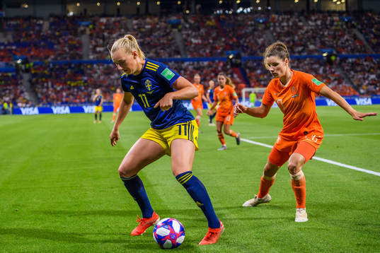 Stina Blackstenius of Sweden and Daniëlle Van De Donk of