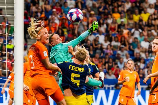 Stefanie Van Der Gragt and goalkeeper Sari Van Veenendaal