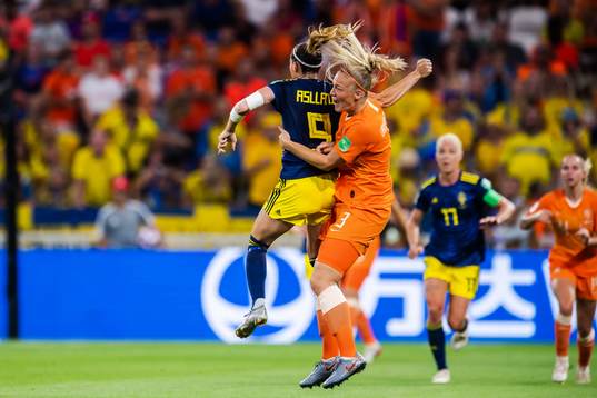 Kosovare Asllani of Sweden and Stefanie Van Der Gragt of
