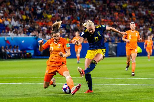 Daniëlle Van De Donk of Netherlands and Stina Blackstenius