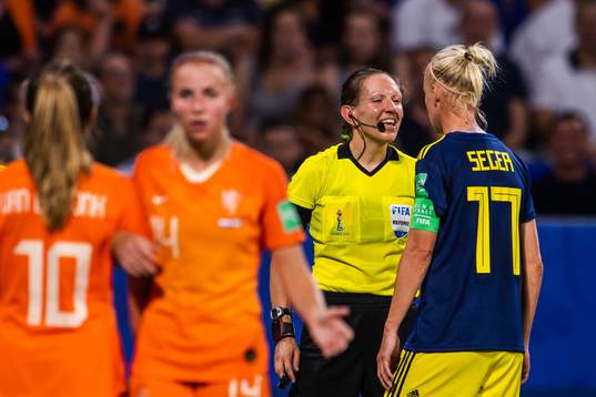 Caroline Seger of Sweden in a conversation with referee