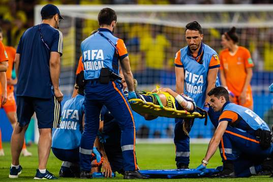 Kosovare Asllani of Sweden is carried of the pitch