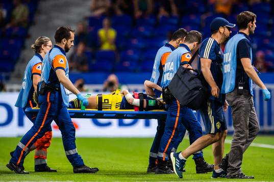 Kosovare Asllani of Sweden is carried of the pitch