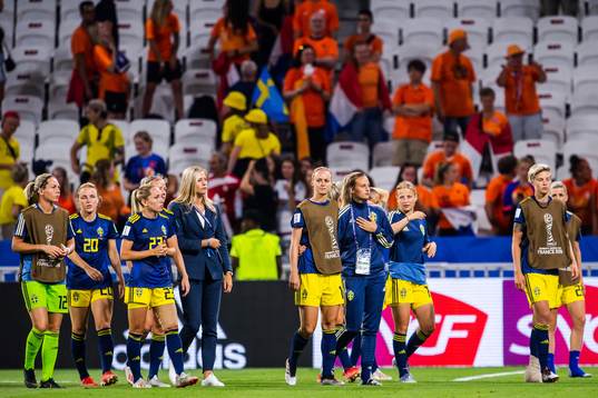 Players of Sweden look dejected