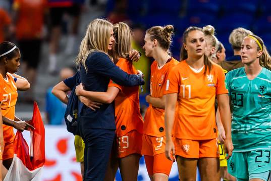 Fridolina Rolfö of Sweden hugs players of of Netherlands