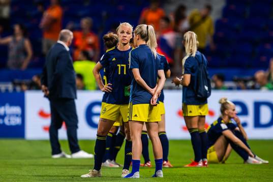 Caroline Seger and Olivia Schough of Sweden look dejected