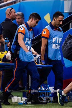 Kosovare Asllani of Swedenis carried off the pitch