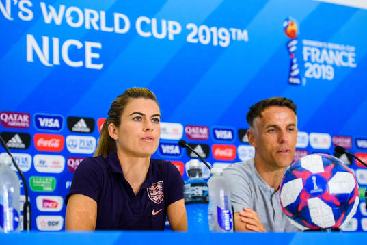 Karen Julia Carney and Phil Neville, Head coach of England
