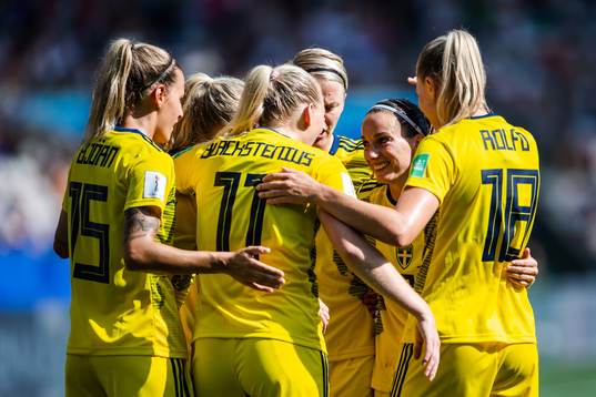 Kosovare Asllani of Sweden celebrate with teammates