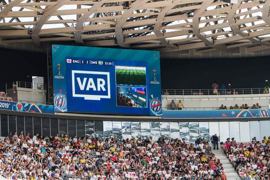 A screen shows VAR