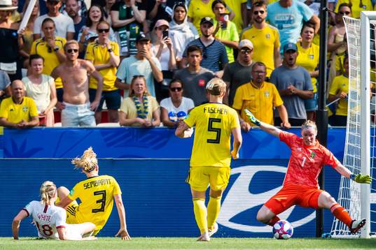 Ellen White of England scores 2-2 behind goalkeeper Hedvig