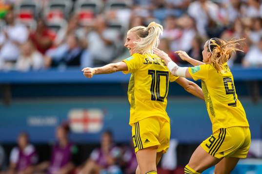 Sofia Jakobsson and Kosovare Asllani of Sweden celebrate