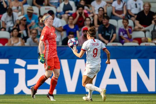 Goalkeeper Hedvig Lindahl of Sweden and Jodie Taylor of