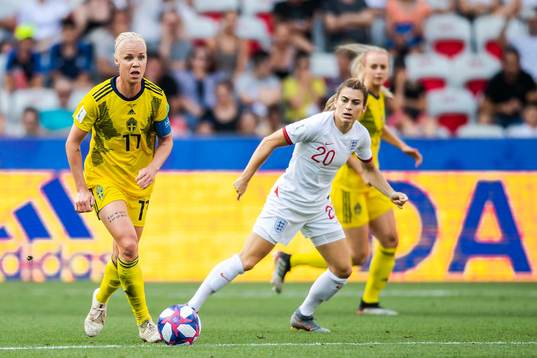 Caroline Seger of Sweden and Karen Carney of England