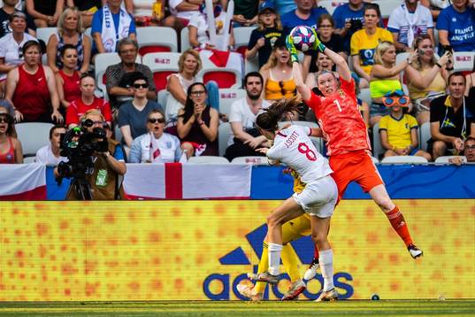 Goalkeeper Hedvig Lindahl of Sweden against Jill Scott of