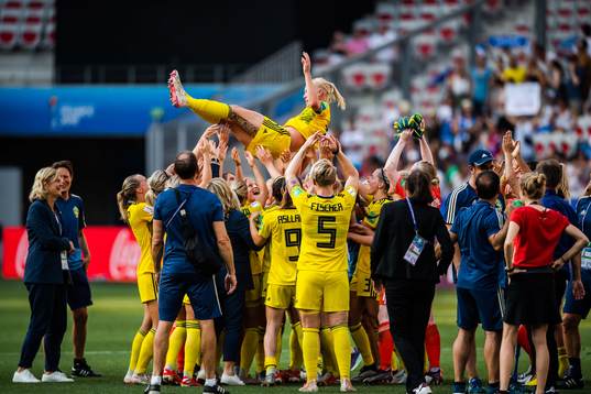 Caroline Seger of Sweden celebrate winning bronze