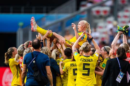 Caroline Seger of Sweden celebrate with teammates