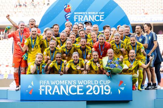 Players of Sweden celebrate with their bronze medals