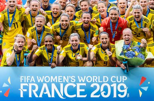 Players of Sweden celebrate with their bronze medals