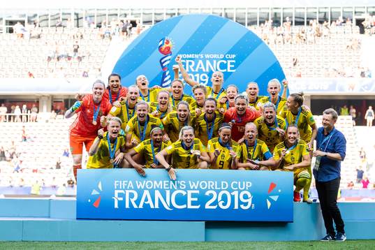 Players of Sweden celebrate with their bronze medals