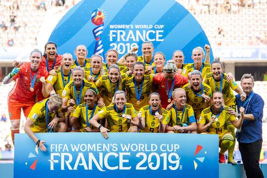 Players of Sweden celebrate with their bronze medals