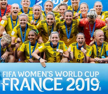 Players of Sweden celebrate with their bronze medals