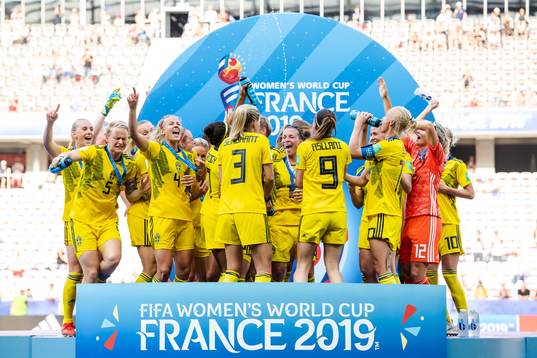 Players of Sweden celebrate with their bronze medals