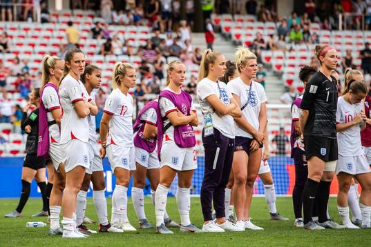 Players of England look dejected