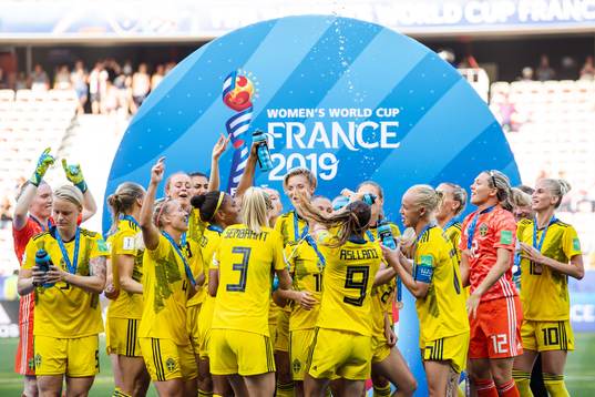 Players of Sweden celebrate with their bronze medals
