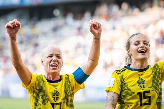 Caroline Seger and Nathalie Björn of Sweden celebrate