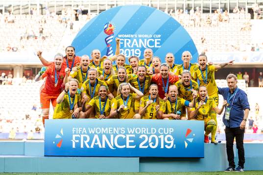 Players of Sweden celebrate with their bronze medals
