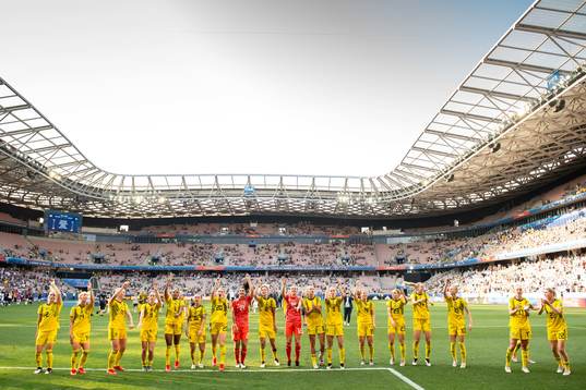 Players of Sweden celebrate winning bronze
