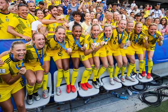 Players of Sweden celebrate with her bronze medals