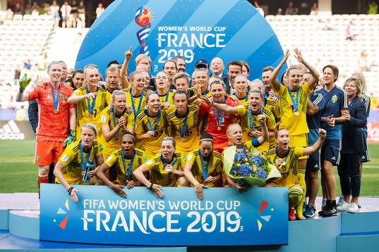 Players of Sweden celebrate with their bronze medals