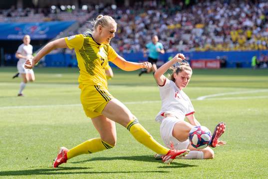 Stina Blackstenius of Sweden and Abbie Mcmanus of England