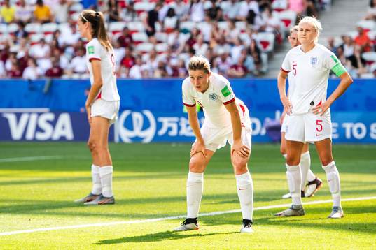 Ellen White and Stephanie Houghton of England look dejected