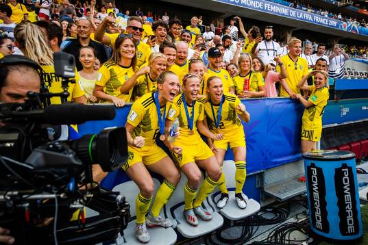 Players of Sweden celebrate with their bronze medals