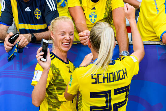 Caroline Seger and Olivia Schough of Sweden celebrate