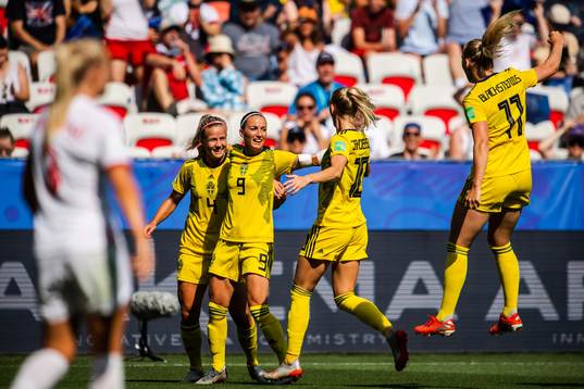 Kosovare Asllani of Sweden celebrate with teammates