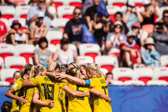 Kosovare Asllani of Sweden celebrate with teammates