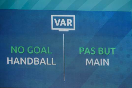 A screen show the VAR decision