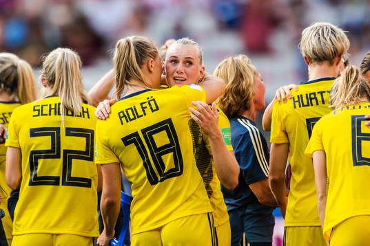 Fridolina Rolfö and Stina Blackstenius of Sweden celebrate