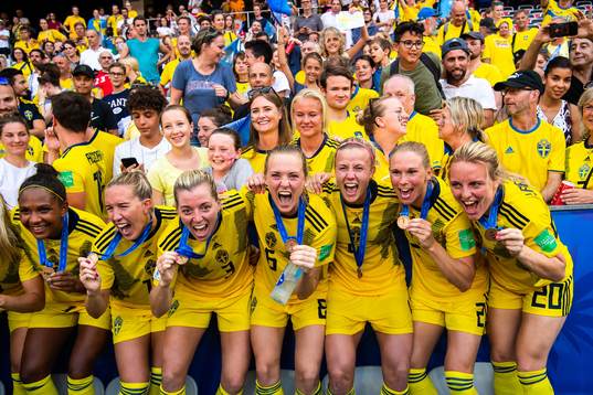 Players of Sweden celebrate with their bronze medals