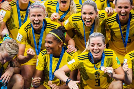 Madelen Janogy and Linda Sembrant of Sweden celebrate