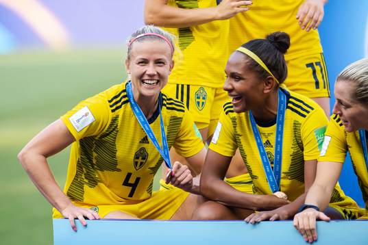 Hanna Glas and Madelen Janogy of Sweden celebrate winning