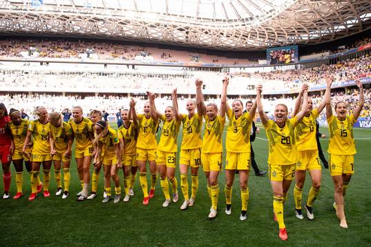 Players of Sweden celebrate winning bronze