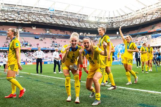 Sofia Jakobsson and Kosovare Asllani of Sweden celebrate