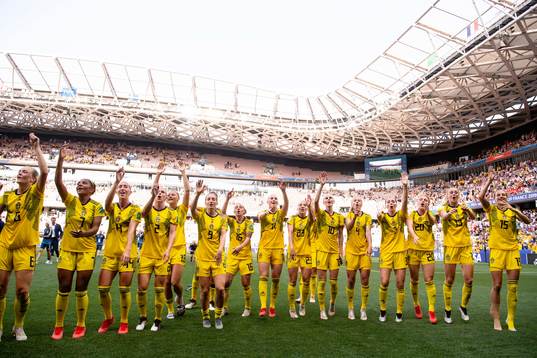 Players of Sweden celebrate winning bronze