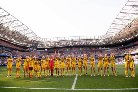 Players of Sweden celebrate winning bronze