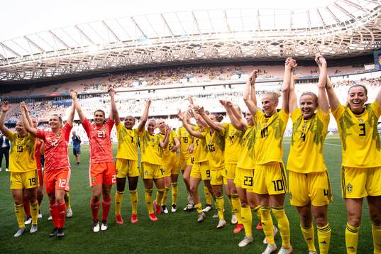 Players of Sweden celebrate winning bronze